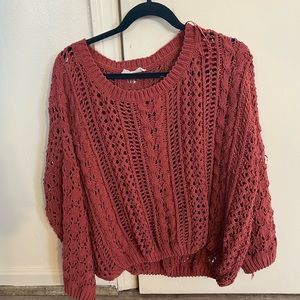 Eloide, large, dark pink sweater with holes